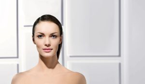 Woman with blue eyes, looking at camera.