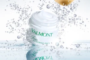 Valmont refreshing face cream with sparkling water droplets.